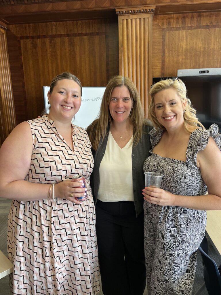 Three WID Liberty Chapter members enjoying a beverage together at the thirsty Thursday event